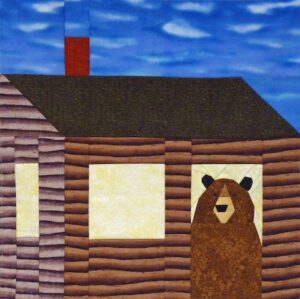 Bear in the cabin quilt block image