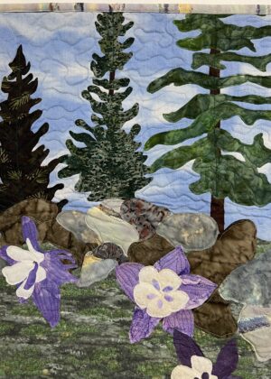 Close up of Rocky columbines art quilt